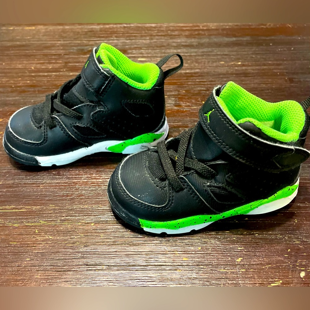 Black and neon green toddler Nikes
